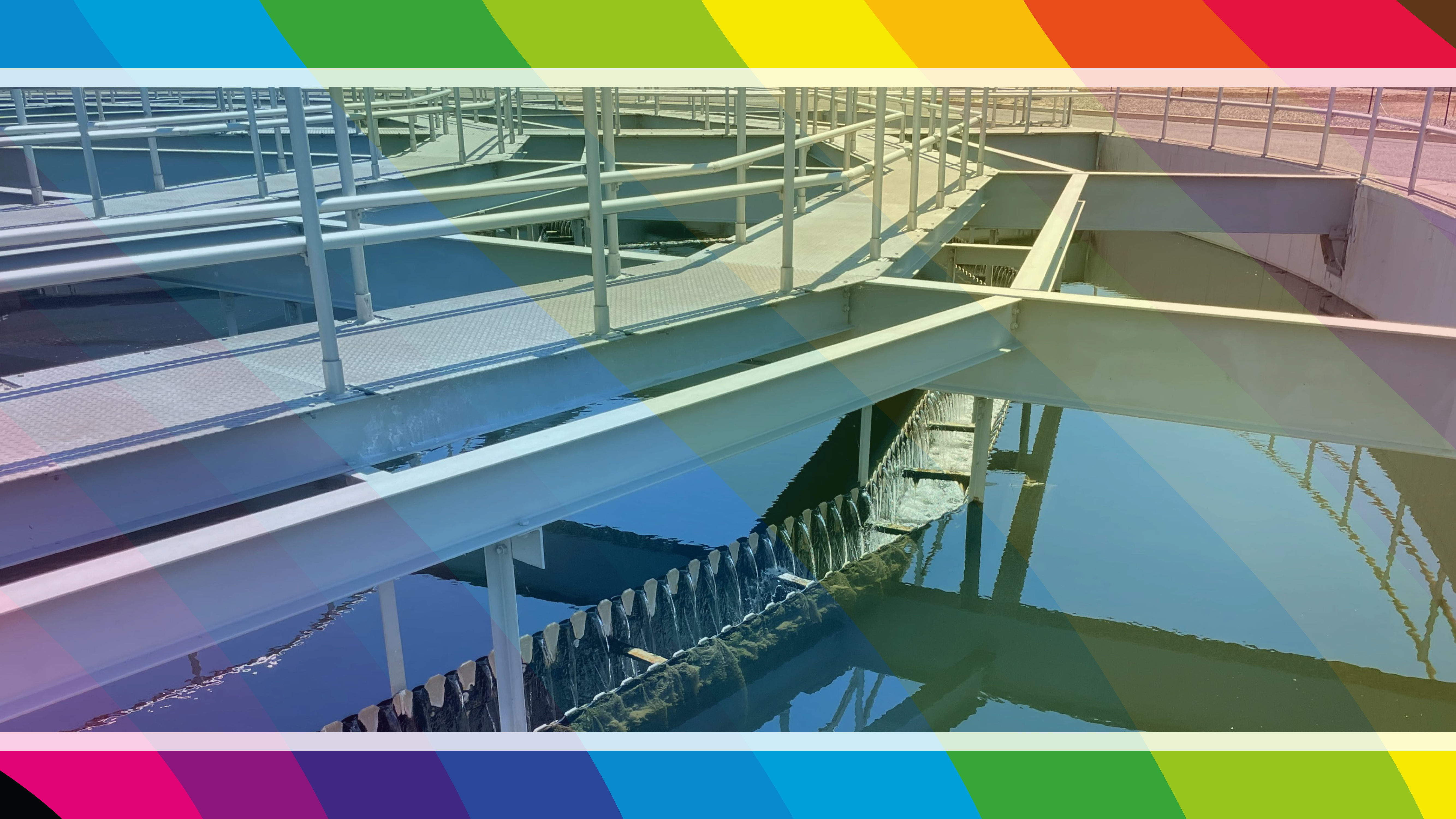 Regional San Wastewater Treatment Plant Graphic. A graphic with Pride Month colors laid over a photo taken during a tour of the Regional San wastewater treatment plant.