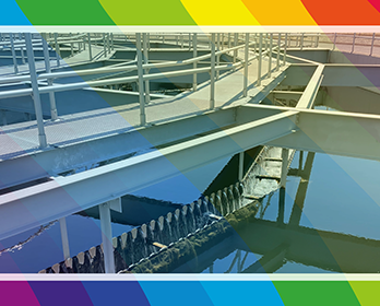A graphic with Pride Month colors laid over a photo taken during a tour of the Regional San wastewater treatment plant.