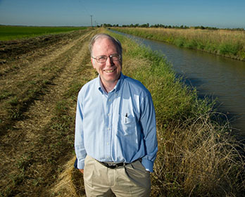 Delta Independent Science Board member Jay Lund stands near the Yolo Bypass wetlands.