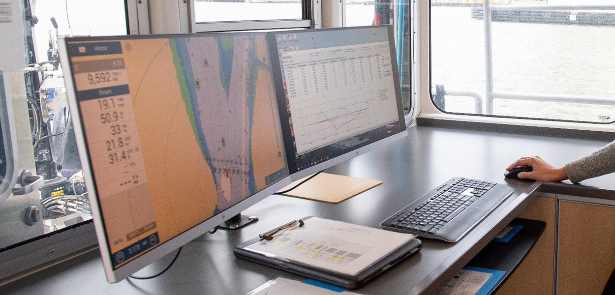 A scientist analyzing digital water sampling aboard the Department of Water Resources’ research vessel, the Sentinel, in the Sacramento-San Joaquin Delta.