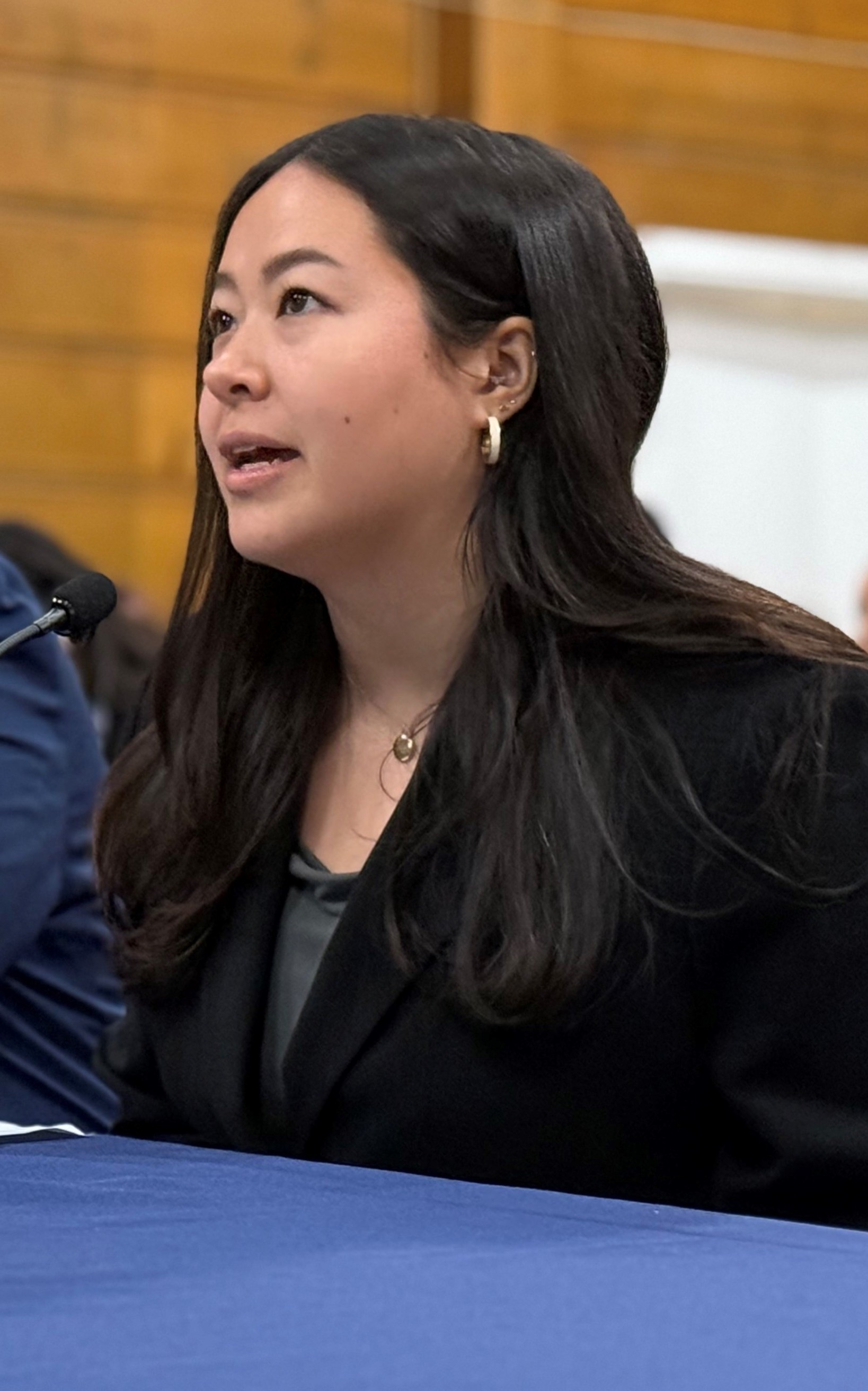 A photo of Delta Stewardship Council Legislative and Policy Advisor Audrey Cho speaking into a microphone.